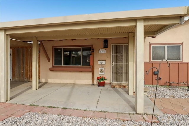 doorway to property featuring a patio