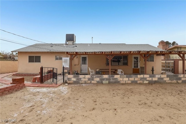 rear view of property with a patio