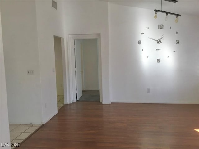 empty room with wood-type flooring