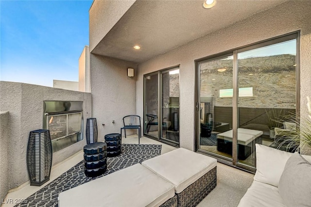 view of patio / terrace with a balcony