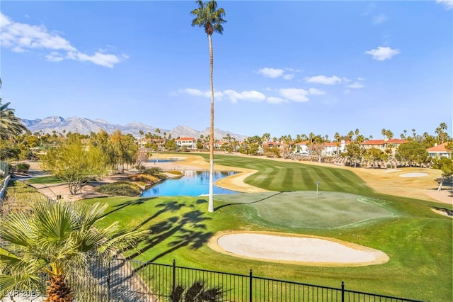 view of property's community featuring a water and mountain view