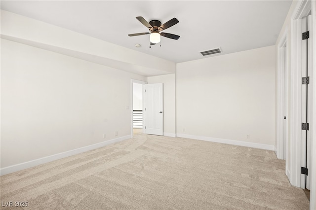 unfurnished bedroom featuring light carpet and ceiling fan