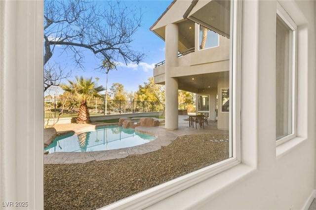 view of swimming pool with a patio