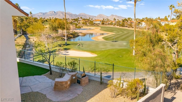 view of property's community with a water and mountain view