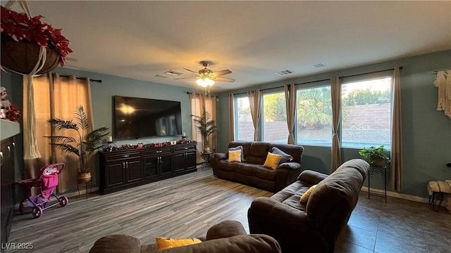 living room with ceiling fan and wood-type flooring