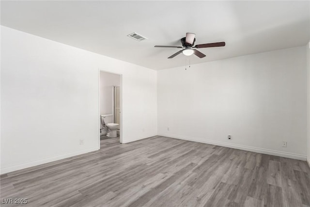 unfurnished room featuring ceiling fan and light wood-type flooring