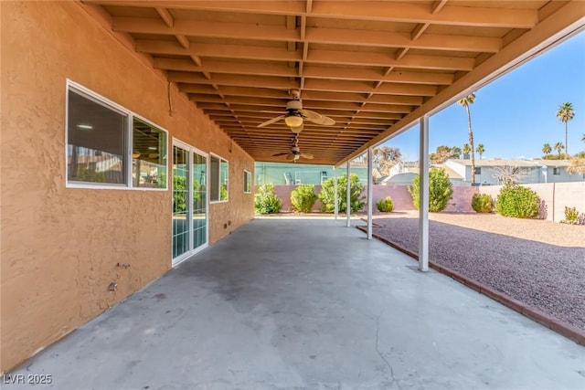 view of patio featuring ceiling fan