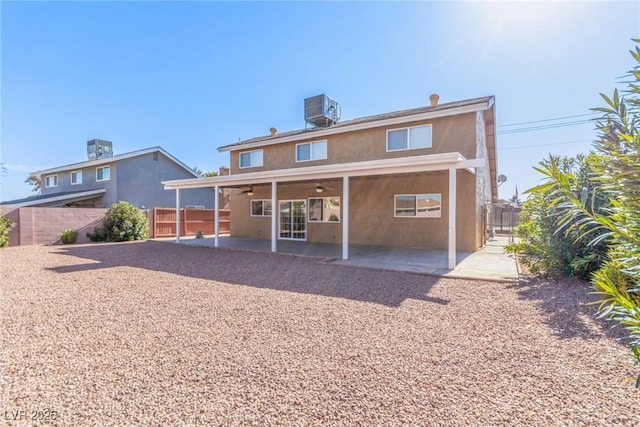 rear view of house featuring a patio, ceiling fan, and central air condition unit