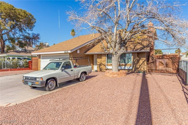 ranch-style home with a garage