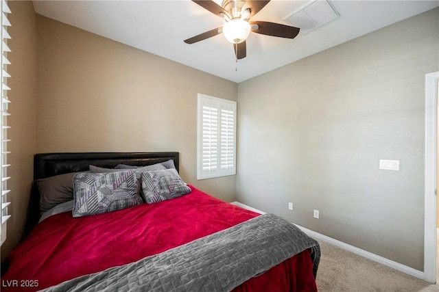 bedroom with ceiling fan and carpet