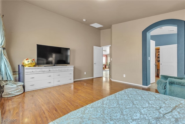 bedroom with wood-type flooring