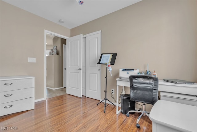 office space featuring light hardwood / wood-style floors