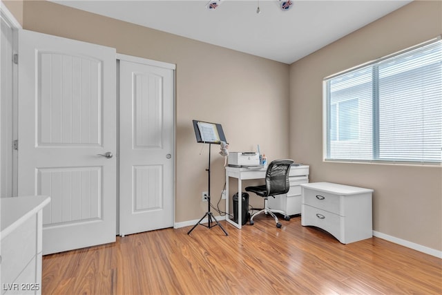 office space featuring light hardwood / wood-style floors