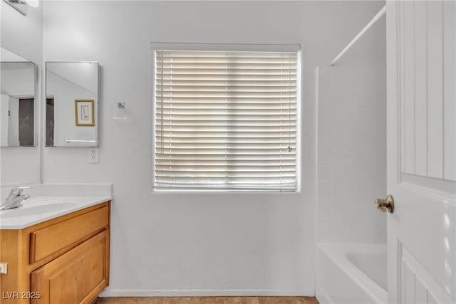 bathroom featuring vanity and shower / bathing tub combination