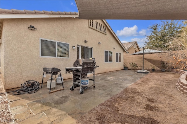 back of house featuring a patio