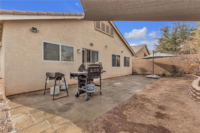 back of house featuring a patio area