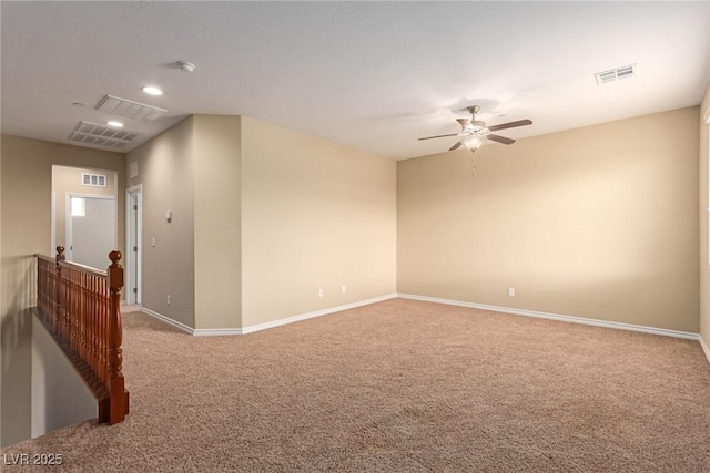 carpeted empty room with recessed lighting, visible vents, ceiling fan, and baseboards