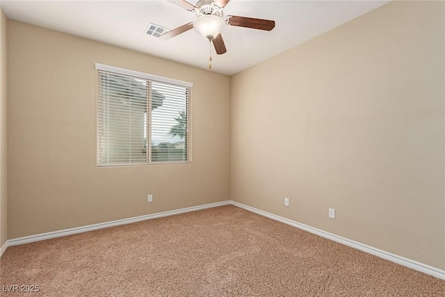 unfurnished room featuring a ceiling fan, carpet flooring, visible vents, and baseboards