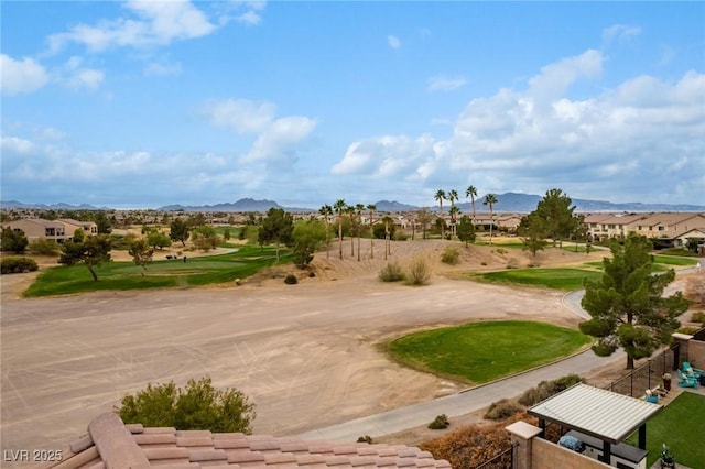 view of community featuring a residential view, fence, and a mountain view