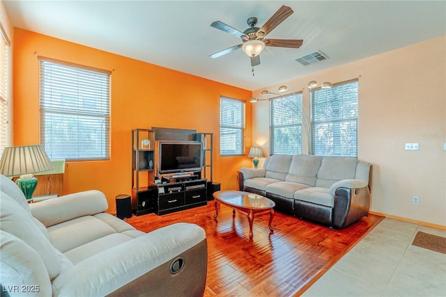 living room featuring ceiling fan