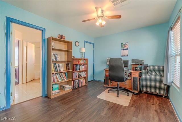 office space featuring hardwood / wood-style flooring and ceiling fan