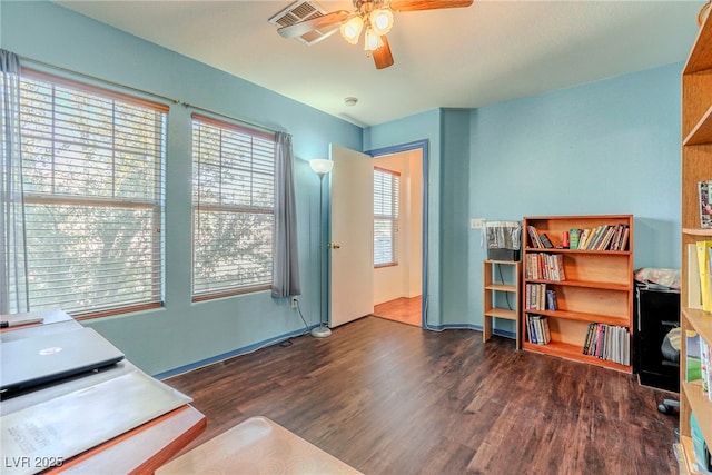 office area featuring ceiling fan and dark hardwood / wood-style floors