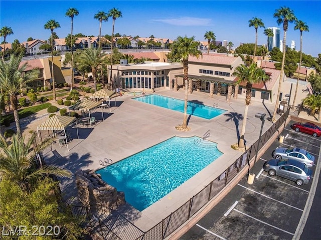 view of swimming pool with a pergola and a patio