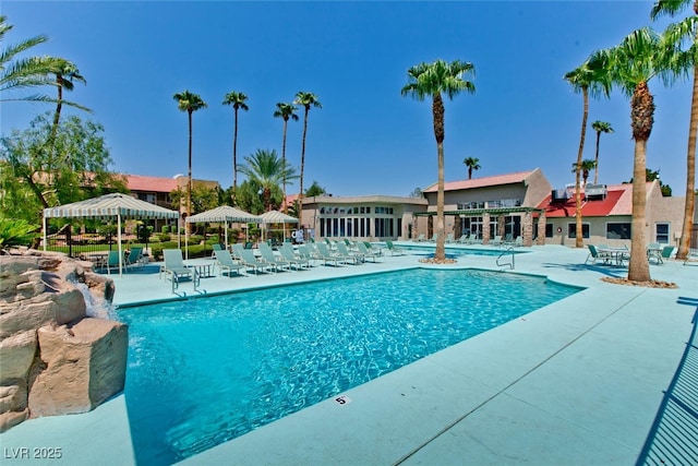 view of swimming pool with a patio area