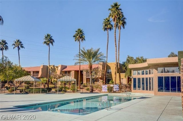 view of pool featuring a gazebo and a patio