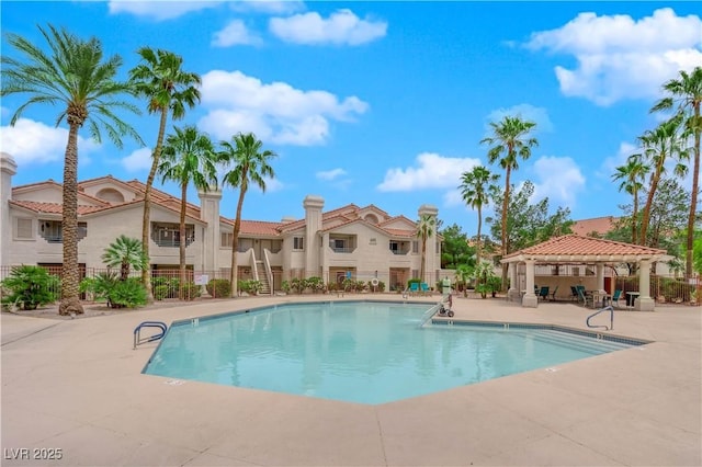 view of pool featuring a gazebo and a patio area