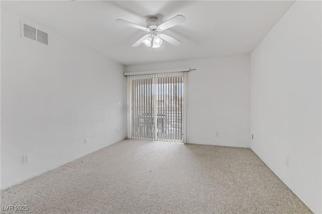 unfurnished room featuring light carpet and ceiling fan