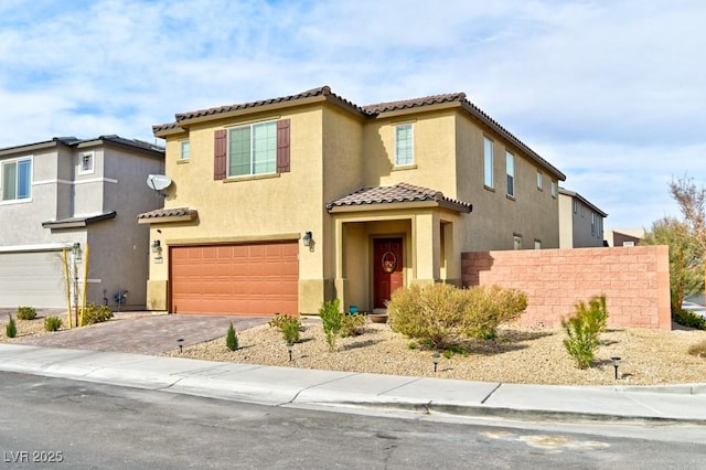 view of front of property with a garage