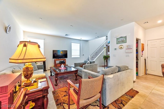 living room with light tile patterned floors