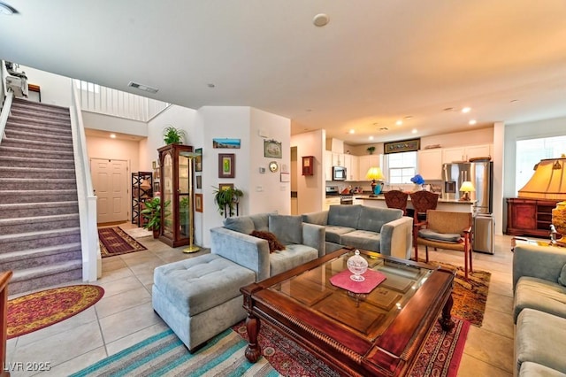 living room featuring light tile patterned floors