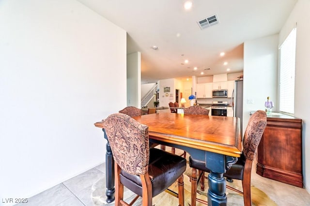 dining room featuring light tile patterned floors