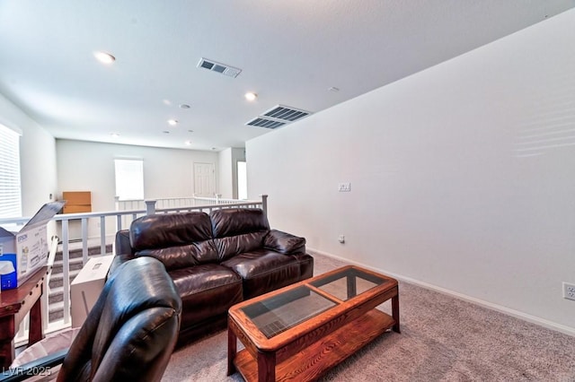 living room with light colored carpet