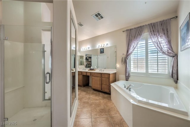 bathroom with vanity, separate shower and tub, and tile patterned flooring