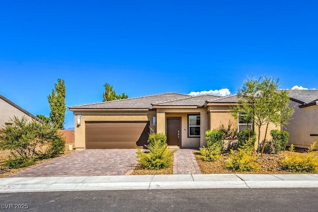 view of front of property with a garage