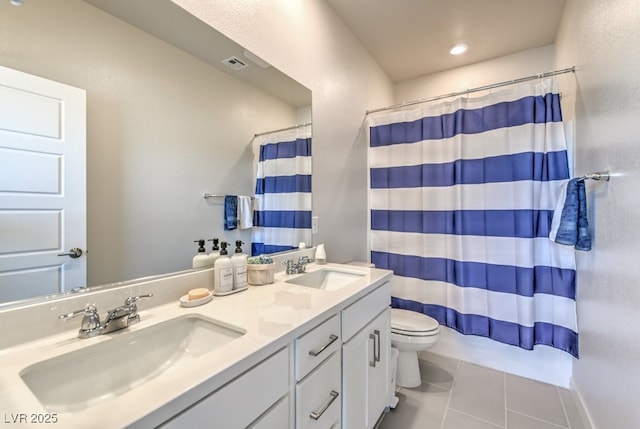 bathroom featuring vanity, a shower with curtain, tile patterned floors, and toilet