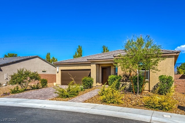 view of front of home with a garage