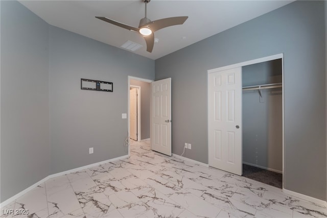 unfurnished bedroom with a closet and ceiling fan