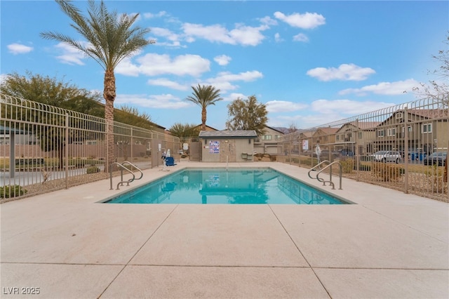 view of pool featuring a patio area