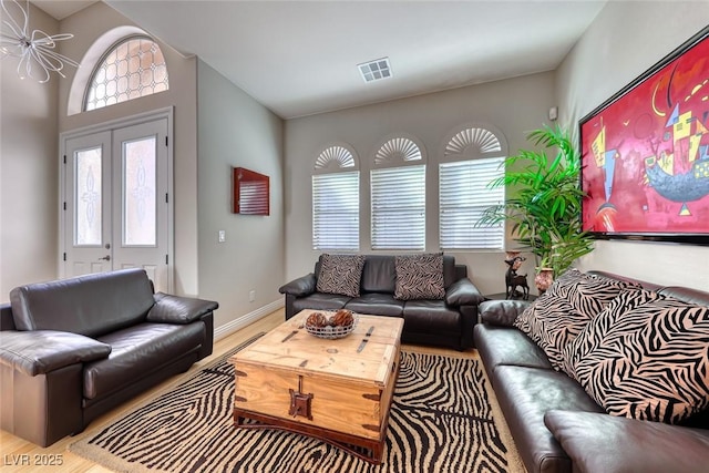 living room with light hardwood / wood-style floors