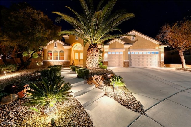 view of front of property featuring a garage