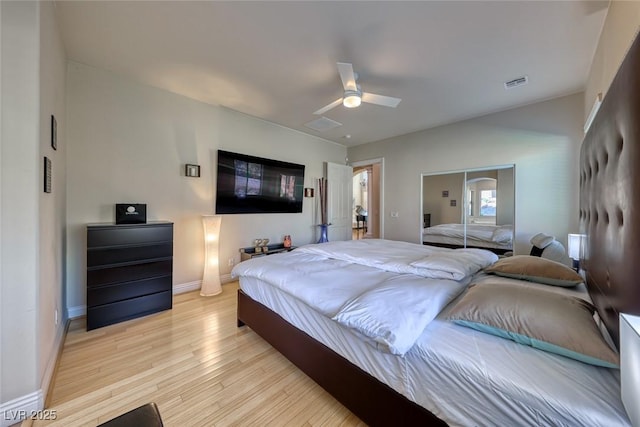 bedroom featuring ceiling fan and light hardwood / wood-style flooring