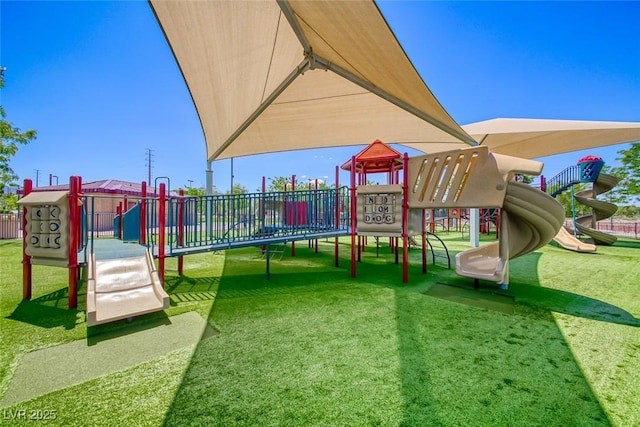 view of jungle gym with a lawn