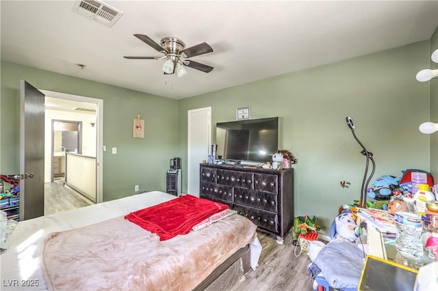 bedroom featuring ceiling fan and light wood-type flooring