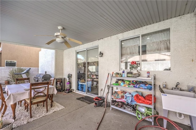 view of patio / terrace featuring area for grilling and ceiling fan