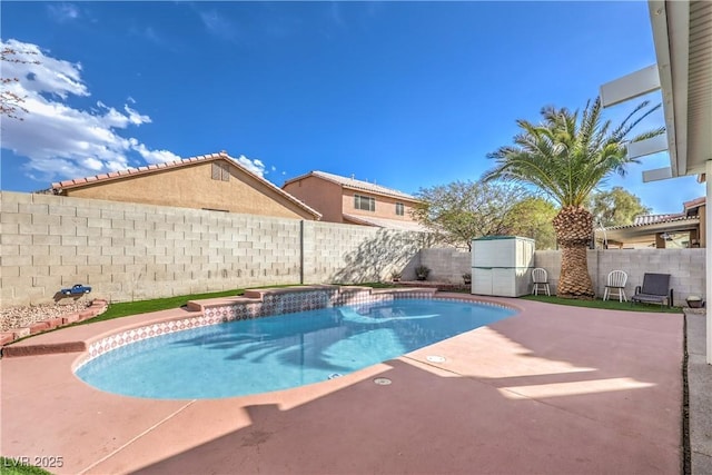 view of swimming pool with a patio area