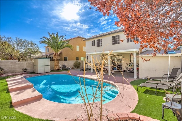 view of pool featuring a patio